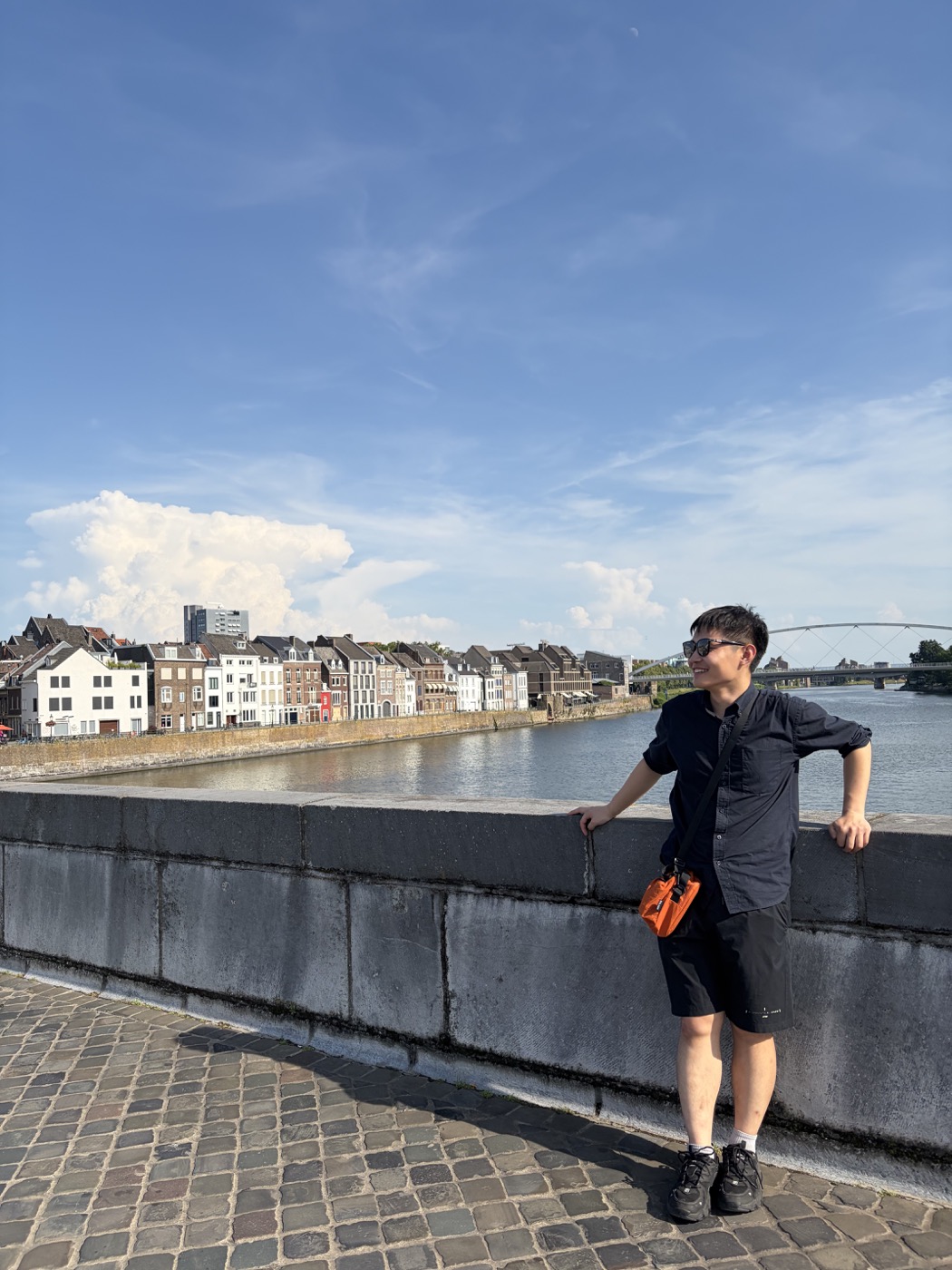 Siyuan Liu standing beside a river